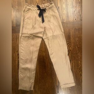 Sacoor Brothers: Beige Trousers with Black Bow Accent